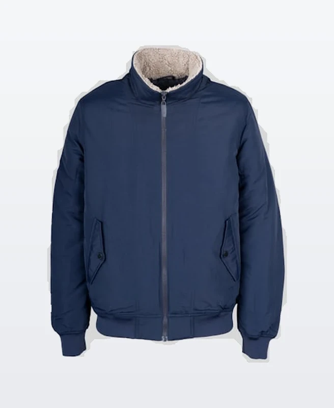 Navy bomber jacket cut out onto a clean neutral studio frame