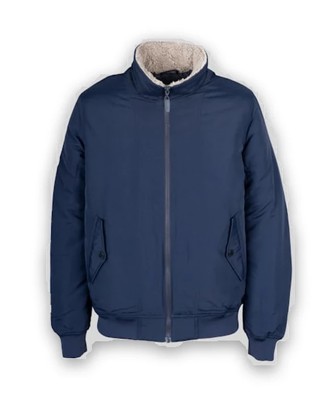 The same navy bomber jacket grounded with a soft generated studio shadow